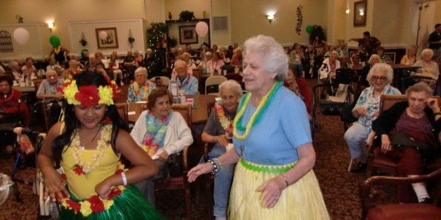 8-22-12_Hawaiian_Luau_Marie_G._learns_some_hawiian_dance_steps-161794_640x320