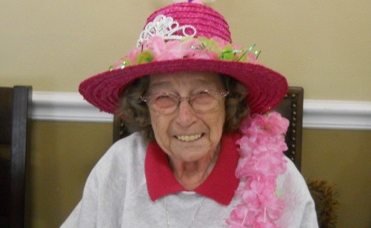 Elderly Woman Wearing Decorated Hat | Senior Assisted Living Nassau County