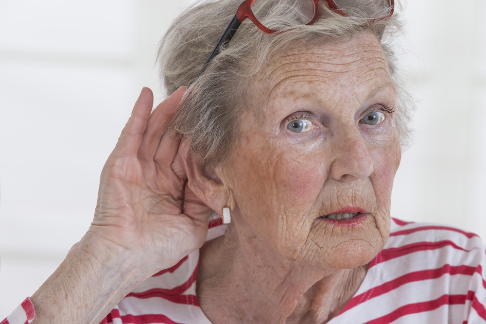 elderly woman with hearing loss