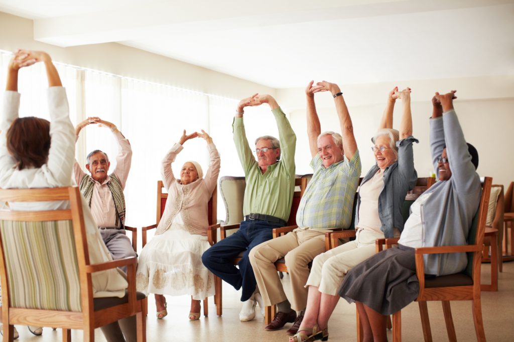 senior exercises in a chair